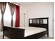 This bedroom features soft natural light and a simple, modern decor at 1504 Virginia Ave # 105, Daytona Beach, FL 32114