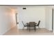Dining area featuring neutral tile and outdoor patio set at 1504 Virginia Ave # 105, Daytona Beach, FL 32114