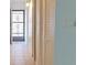 Light and airy hallway with tile flooring and storage at 1504 Virginia Ave # 105, Daytona Beach, FL 32114