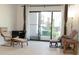 Living room features tile flooring and comfortable seating at 1504 Virginia Ave # 105, Daytona Beach, FL 32114