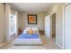 Cozy bedroom featuring a comfortable bed, large window with white curtains, and a stylish decor at 1521 Chatfield Pl, Orlando, FL 32814
