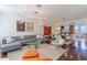 Spacious living area with modern lighting, sofa, and dining area in view at 1521 Chatfield Pl, Orlando, FL 32814