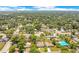 This aerial view showcases the neighborhood with tree-lined streets and a serene environment at 1531 Huntington St, Lakeland, FL 33801