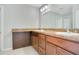 Bathroom features dual sinks with modern fixtures and a large mirror at 1531 Huntington St, Lakeland, FL 33801