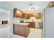 Functional kitchen with stainless steel appliances and granite countertops at 1531 Huntington St, Lakeland, FL 33801