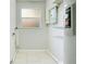 Laundry room with tile flooring, a window, and utility hookups at 1531 Huntington St, Lakeland, FL 33801