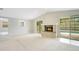 Spacious living room featuring fireplace and access to the outdoor pool at 1531 Huntington St, Lakeland, FL 33801