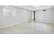 Bright and airy room with tile floors and neutral paint at 1531 Huntington St, Lakeland, FL 33801