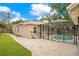 This home features a screened-in pool, perfect for outdoor enjoyment and relaxation in a private setting at 1531 Huntington St, Lakeland, FL 33801