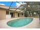 The in-ground pool is screened-in at 1531 Huntington St, Lakeland, FL 33801