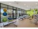 The community gym provides various equipment and space for diverse fitness activities at 15975 Marina Bay Dr, Winter Garden, FL 34787