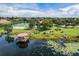 A gazebo on the water, part of a community recreation area including a tennis court at 1638 Whitney Isles Dr, Windermere, FL 34786