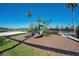Community playground features a slide and climbing structure close to the volleyball court at 1638 Whitney Isles Dr, Windermere, FL 34786