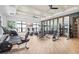 Spacious gym includes modern workout equipment and natural lighting through large windows at 1664 Crowncrest Dr, Apopka, FL 32703