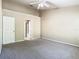 Bright bedroom with a view into an adjacent bathroom and a second doorway at 1810 Shadow View Cir # 1810, Maitland, FL 32751