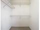 Walk-in closet with wire shelving for clothes and shoe storage at 1810 Shadow View Cir # 1810, Maitland, FL 32751