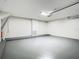 Spacious garage with a painted floor and good lighting at 1810 Shadow View Cir # 1810, Maitland, FL 32751