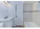 Updated bathroom with modern vanity, subway tile, and tub/shower combo at 205 Elaine Pl, Chuluota, FL 32766