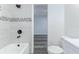 Beautiful bathroom with updated tile, and modern showerhead and hardware at 205 Elaine Pl, Chuluota, FL 32766