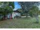 Charming home with brick details and lush landscaping at 205 Elaine Pl, Chuluota, FL 32766