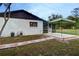 Private backyard showcasing a screened-in patio with a cozy tent, perfect for outdoor relaxation at 205 Elaine Pl, Chuluota, FL 32766