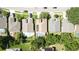 Aerial view of residences with screened-in pools, solar panels, and well-maintained lawns at 2343 Walnut Heights Rd, Apopka, FL 32703