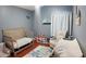 Charming bedroom with wood-look floors, multiple sleep and play areas, and a themed decor at 2343 Walnut Heights Rd, Apopka, FL 32703
