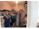 Walk-in closet with ample storage space and shelving, providing convenient organization solutions at 2343 Walnut Heights Rd, Apopka, FL 32703