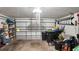 Spacious garage with ample storage and a garage door at 2343 Walnut Heights Rd, Apopka, FL 32703