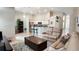 Open-concept living room seamlessly connected to the kitchen, creating a spacious and inviting atmosphere at 2343 Walnut Heights Rd, Apopka, FL 32703