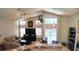 Spacious living room offering great natural light and an open transition to the outdoor pool area at 2343 Walnut Heights Rd, Apopka, FL 32703