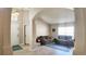 Bright living room with tile flooring, neutral paint, and ample natural light at 2343 Walnut Heights Rd, Apopka, FL 32703
