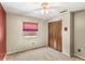 Bedroom with a ceiling fan, window with blinds, and a closet with paneled doors at 2409 Pinyon Ct, Kissimmee, FL 34746