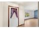 Home entryway and front door with nearby window overlooking the front yard at 2409 Pinyon Ct, Kissimmee, FL 34746