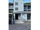Condo building entrance with a ramp and assigned parking at 25306 Northlake Dr # 25306, Sanford, FL 32773