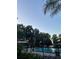 Community pool with beautiful landscaping and a gazebo, providing a relaxing outdoor amenity at 25306 Northlake Dr # 25306, Sanford, FL 32773