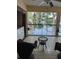 Relaxing porch with seating, laundry and view of the water and trees at 25306 Northlake Dr # 25306, Sanford, FL 32773