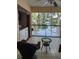 Relaxing porch with seating, laundry and view of the water and trees at 25306 Northlake Dr # 25306, Sanford, FL 32773