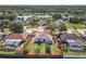 Aerial view of the property highlighting the backyard with fence and surrounding neighborhood at 2620 Abbey Ave, Orlando, FL 32833