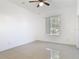 Bedroom with tiled floor, a ceiling fan, and natural light from the window at 2620 Abbey Ave, Orlando, FL 32833