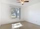 Bedroom with tiled flooring and a window bringing in natural light at 2620 Abbey Ave, Orlando, FL 32833