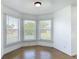 Bright breakfast nook featuring a tiled floor and three windows with lovely views at 2620 Abbey Ave, Orlando, FL 32833