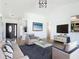Bright living room featuring tile flooring, modern furniture, and large windows at 2620 Abbey Ave, Orlando, FL 32833