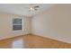 A quiet bedroom with natural light and classic ceiling fan at 2714 Moncayo Ave, The Villages, FL 32162