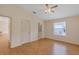 Spacious bedroom with hardwood floors and ample natural light at 2714 Moncayo Ave, The Villages, FL 32162