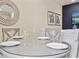 Dining area adjacent to the kitchen with dining table set for a party at 2920 On The Rocks Pt, Kissimmee, FL 34747