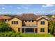 Back exterior view showing a covered porch at 3041 Boating Blvd, Kissimmee, FL 34746