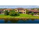 The home features a spacious backyard overlooking the lake at 3041 Boating Blvd, Kissimmee, FL 34746