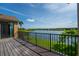 Balcony with wood-style floor and lake view at 3041 Boating Blvd, Kissimmee, FL 34746