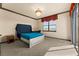 Bedroom featuring carpet floors, chandelier, and a window at 3041 Boating Blvd, Kissimmee, FL 34746